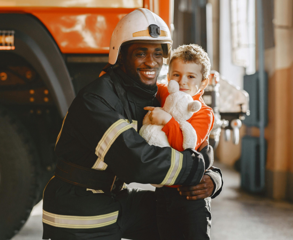 a man holding a child