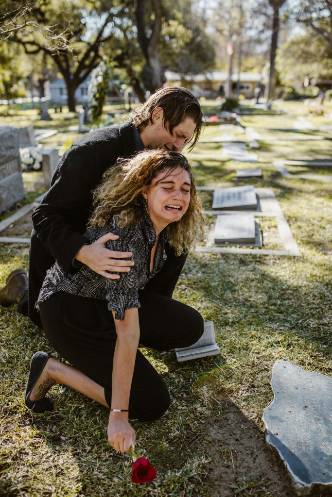 an image of a grieving family member who is eligible to file asbestos trust fund claim