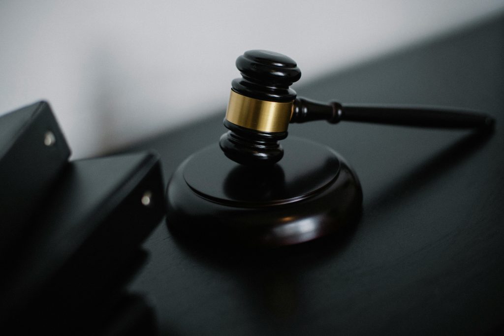 a symbol of legal process representing the complexities of asbestos-related cases